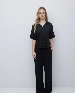 Pantalones punto fluidos negro