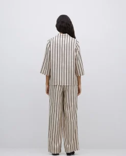 Pantalones wide leg tencel crudo