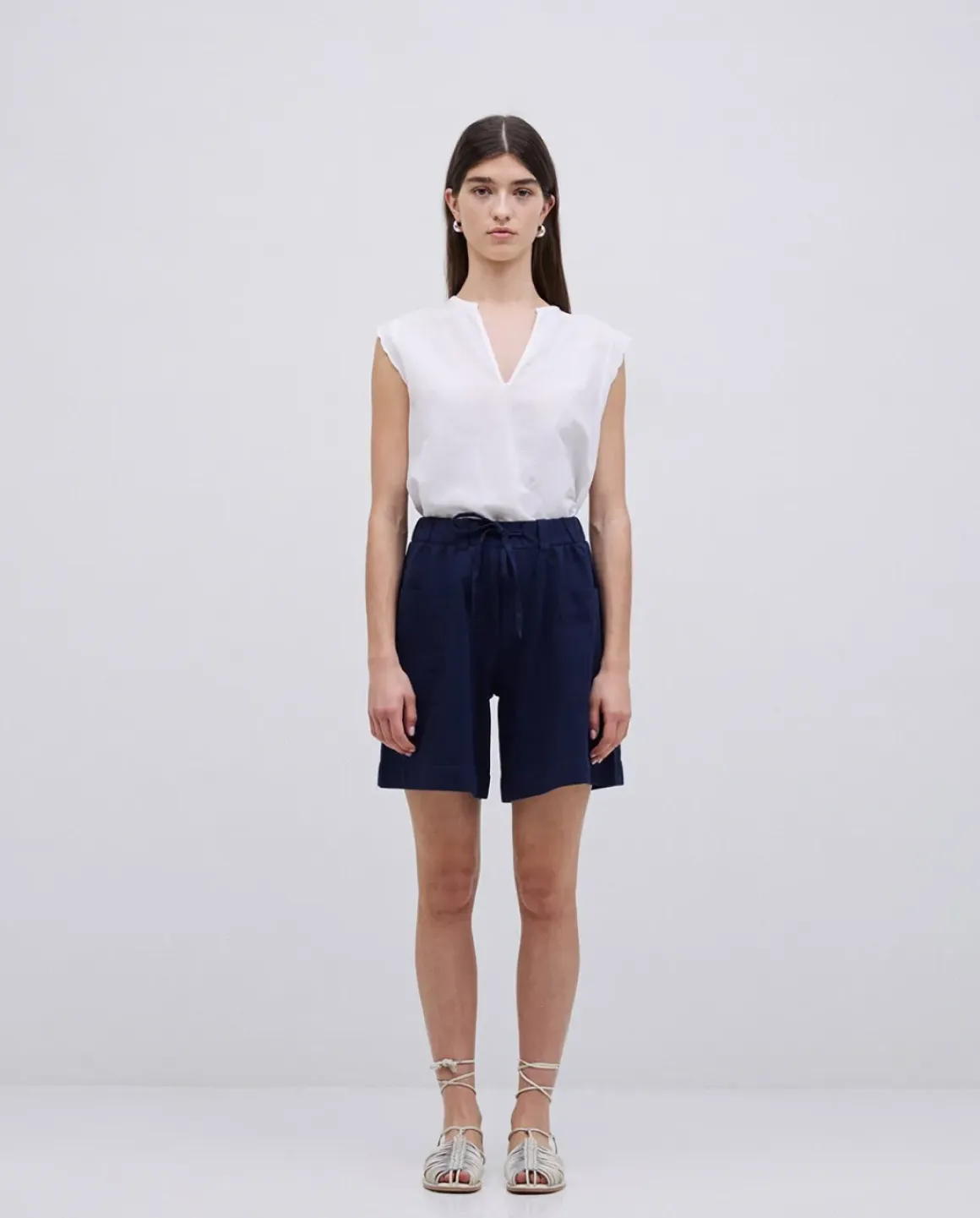 Shorts bolsillos plastrón azul oscuro
